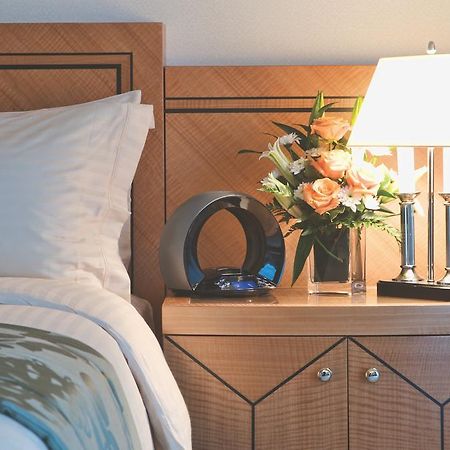 Wiseman Grand Hotel Doha Exterior foto A bedside table