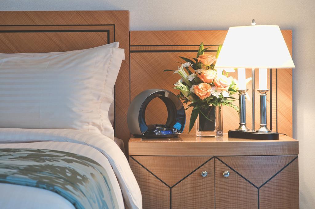 Wiseman Grand Hotel Doha Exterior foto A bedside table